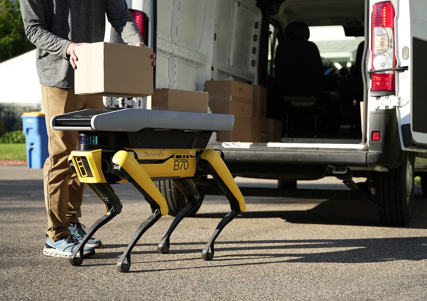 Boston Dynamics Atlas performing warehouse logistics tasks